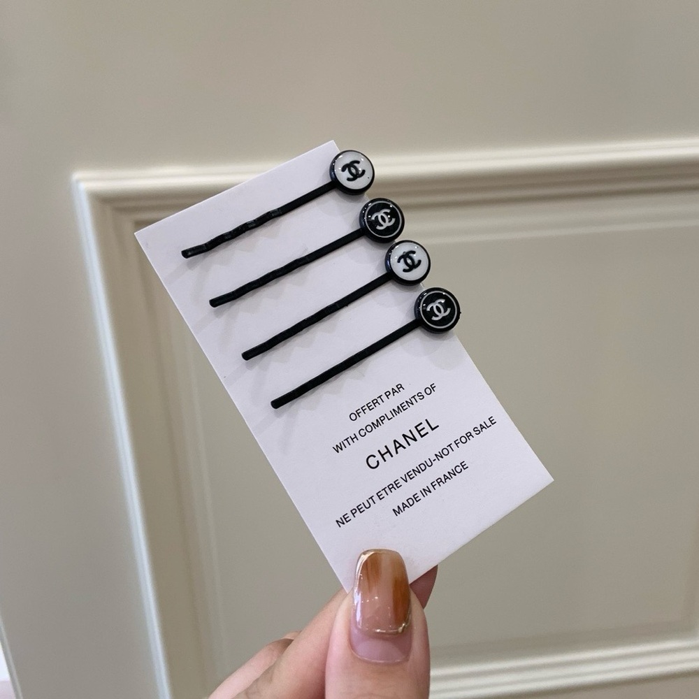 CHANEL Black and White Logo Hair Clips